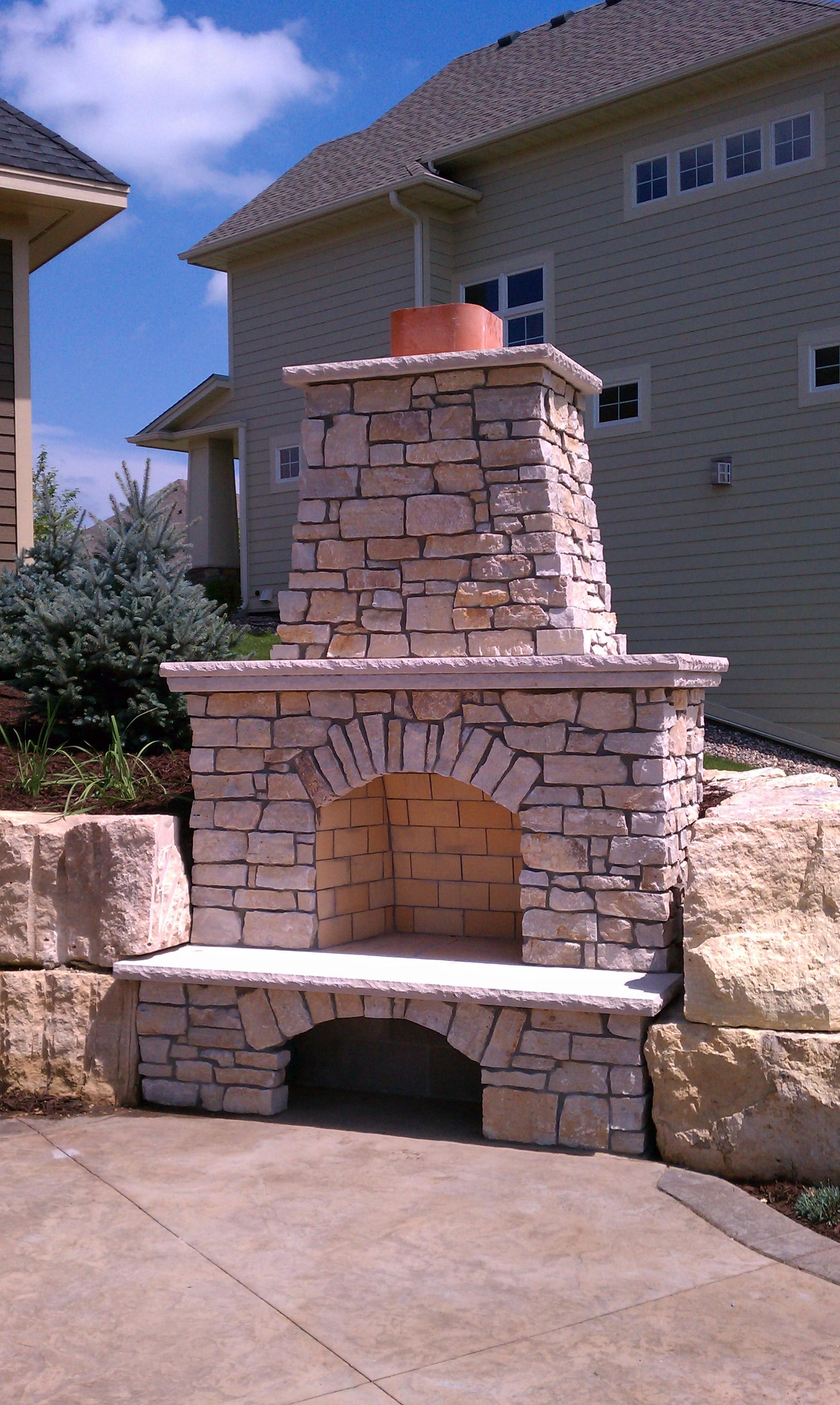 Custom Outdoor Fireplace with our Signature Two Tiered